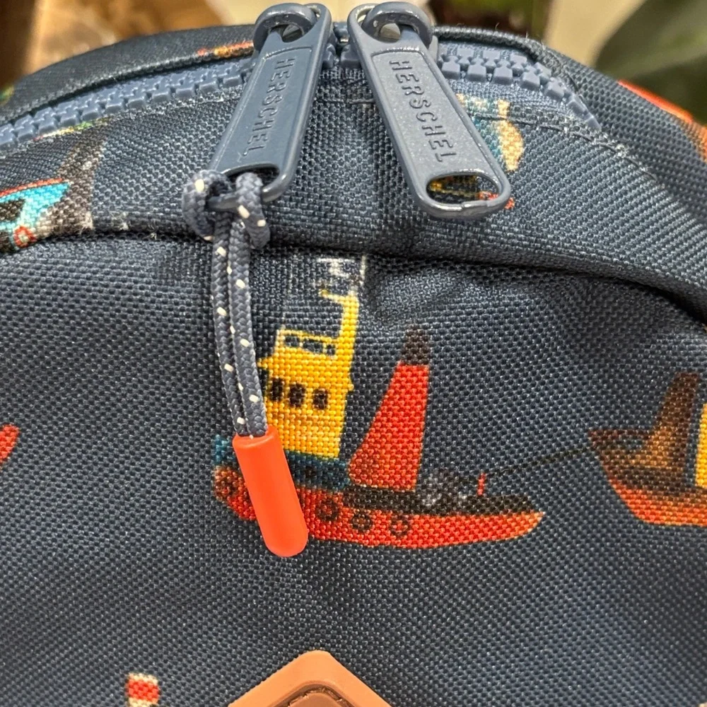 Herschel Supply Co. Kids' Heritage Navy Backpack with Colorful Tug Boat Print